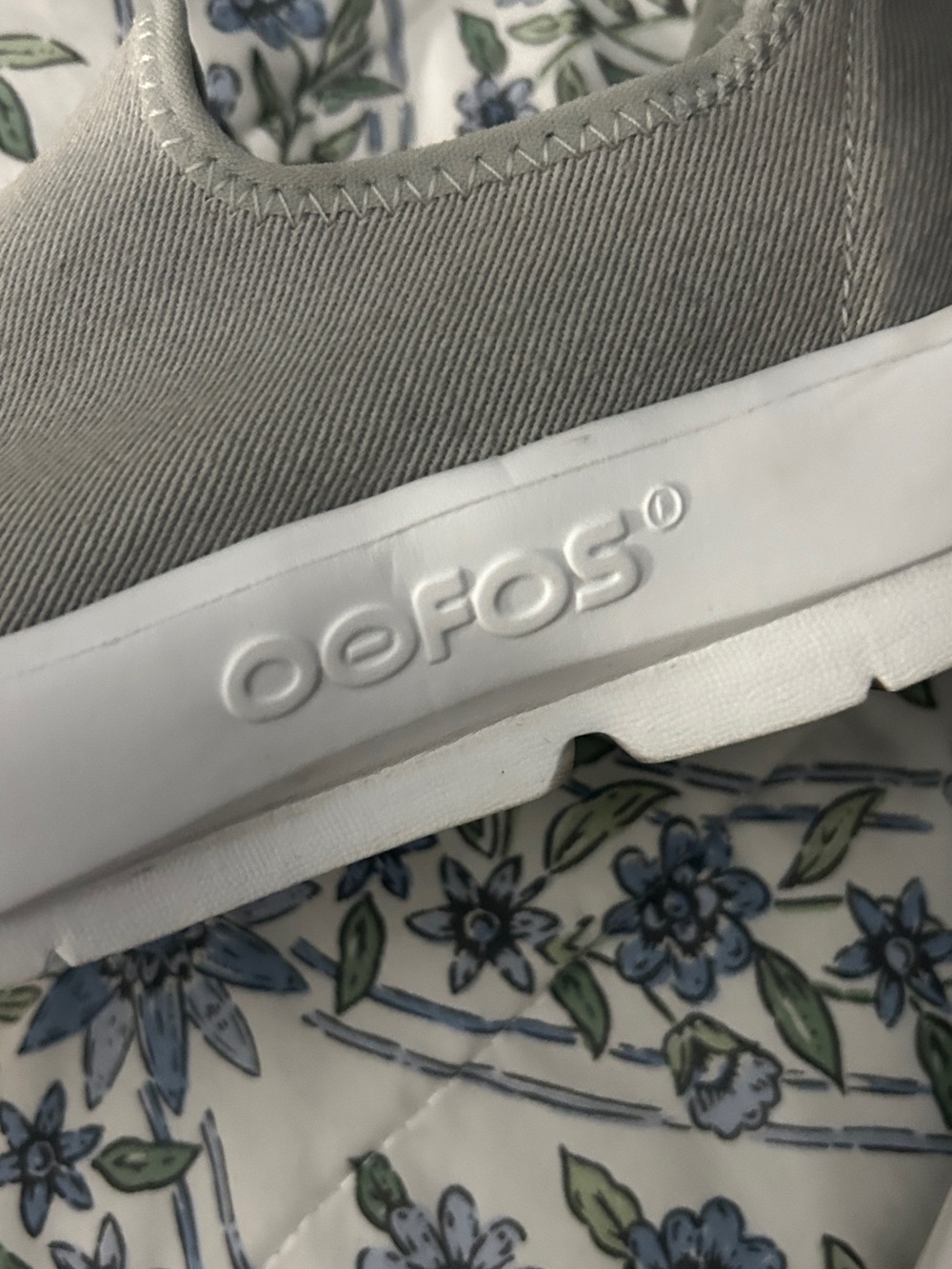 OOFOS women’s Light Gray Slip-On Recovery Sneaker with White Sole